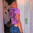 A pixelated image of a person in a purple shirt and blue jeans standing near a door with text overlays on magenta backgrounds.