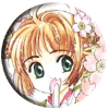 Circular anime-style icon of a girl with orange hair and green eyes, wearing pink clothing, holding fingers to lips in front of floral background.