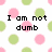 Pixelated text on a polka-dot background with pink and green circles, showing phrases like "I am not dumb" and "I just have alot of Useless Information.".