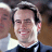 Static 48x48 pixel icon showing a close-up of a person's face with dark hair and light skin, wearing a white shirt and black tie against a blurred background.