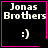 Four identical pixelated display "Jonas Brothers" text with a smiley face, each bordered in pink; two have additional symbols