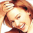 A woman with reddish-brown hair appears in three distinct poses: one with hand raised to hair, one with hair down, and one with head tilted, all showing a smiling expression.