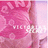 Pixelated pink-themed image with text fragments and a partial figure on the left, set against a solid light pink background.