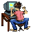 Pixelated figure in pink shirt and blue pants sits at desk with CRT monitor, hands raised in motion