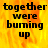 Pixelated text on a fiery background with one section grayed out, showing 'together were burning up' in black letters.