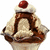 Pixelated dessert image with whipped cream, chocolate drizzle, and cherry on top; one version includes red text overlay.