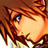 Pixelated close-up of a character's face with orange-brown hair and blue eyes, rendered in an anime style on a brown background.
