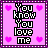 A 48x48 pixel animated buddy icon featuring a pink background with heart symbols and the text "You Know You Love Me" in black-and-white block letters, displayed as two sequential frames of an animation.