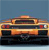 A pixelated rear view of a car with orange and brown tones against a blue background, showing taillights and a dark lower section.