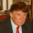 Pixelated image of a person in business attire with orange text reading "You're fired." on the right side against black background.