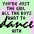 Pixelated text on a gradient background reads 'YOU'RE JUST THE GIRL ALL THE BOYS WANT TO HANG WITH' with a stylized signature below.