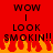 Red background with black text reading "WOW | LOOK SMOKIN!!" and orange-yellow flames at the bottom, displayed in two identical side-by-side