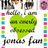 A static image with a green heart, colorful vertical bars, and text reading 'jones fan' alongside a person with brown hair and a patterned scarf.