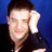 Static 48x48 pixel icon showing a person with dark hair against blue background, cropped to upper body with visible shoulder and neck area.