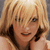 A 2x2 contact sheet of a Britney Spears animated icon showing two distinct frames with pixelated facial features and red text on the right side.
