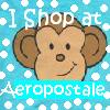 A cartoon monkey face with brown ears and a light brown face, smiling, set against a blue background with white polka dots and text reading "I Shop at Aeropostale".