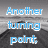 Pixelated text in blue and purple reads 'Another turning point,' and 'a fork stuck in the road' over a grayscale background with dark shapes.