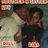 Two figures embrace in a close-up pose; one wears light-colored clothing, the other dark. Pixelated rendering with muted tones.