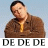 A 4-frame animated contact sheet showing a person in a brown jacket with arms crossed, each frame displaying the text "DE DE DE" below with one instance of "DE" highlighted yellow.
