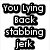 Pixelated text and a red heart on white background with gray section, reading 'You Lying Back stabbing jerk Love You' above the heart.