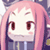 Pixelated anime-style character icon with pink hair and purple clothing against a blurred background.