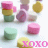 Animated contact sheet of a Valentine's Day-themed icon featuring pastel candy hearts and XOXO text in pink, yellow, green, purple, and white colors with subtle frame-to-frame variations.