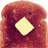 A pixelated image of a slice of toasted bread with a square butter pat, accompanied by purple text on a black background.