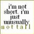 Pixelated text reads "i'm not short, i'm just unusually not tall" on a light background with subtle border.