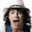 A four- shows a person with long hair and hat, red text reading LET'S GO RUN IN TRAFFIC!, two people embracing, and purple oooops! text
