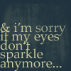 Static image with light-colored text on a dark background reading "& i'm sorry if my eyes don't sparkle anymore...".