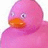 Pixelated pink duck with orange beak, single visible eye, and subtle facial shading against white background.