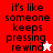 A pixelated text-based image with 'it's like someone keeps pressing rewind' in black on red and white backgrounds, featuring a small star-shaped cursor icon.