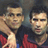 Static 48x48 pixel buddy icon showing two male soccer players in red jerseys with dark blue accents, side-by-side against a gray background.