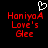 Red pixelated text 'HaniyaA Love's Gee' on black background with white heart outline above text, two identical frames side-by-side.