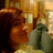 A pixelated image shows a person with brown hair and green clothing on the left, next to black background text reading 'E EXTRE =] E WO', with visible pixelation in all areas.