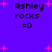 Purple background with pink starbursts and black text reading "Ashley rocks =O" in four identical quadrants.