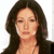 Static pixelated image of a person with long dark hair, closed eyes, and light skin tone against a white background.