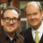 A 48x48 pixel buddy icon featuring two men in business attire on the left and green text reading "Original Icons .com" on a dark green background to the right, displayed as part of an animated contact sheet with two frames.