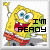 Pixelated yellow cartoon character with wide eyes, open mouth showing teeth and tongue, wearing red shorts over white pants, holding a spatula-like object.