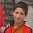 Pixelated static image of a person in red clothing with dark hair against a textured background, partially obscured by a bright red vertical element on the left.
