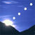 Pixelated blue sky with four white stars and a bright moon over dark silhouetted hills.