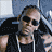 A pixelated contact sheet showing two frames of an animated icon featuring a person with sunglasses and the text "TR3 RELOADED" on a brown background.