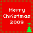 Red square icon with green dotted border displaying "Merry Christmas 2009" text and green Christmas tree symbols in four quadrants.