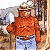 A pixelated contact sheet showing two frames of an animated Smokey the Bear icon with a green text overlay reading "Original Icons .com" on the right side.