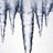 Icicles hang against a light background with blue pixelated text reading 'is it cold' and 'or is it just me??'