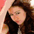 Six distinct poses of a woman with long brown hair in various outfits and settings, displayed as a
