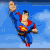 Animated contact sheet showing five sequential frames of a cartoon Superman flying against blue sky with clouds, each frame depicting slight variations in pose and cape position.