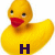 Yellow rubber duck with red beak and black eyes, displaying sequential text changes from 'H' to 'HO' to 'HOT', then 'HOT' with orange flame graphics below.