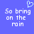 Blue background with white pixelated text reading "So bring on the rain" and a light blue heart symbol above the left side of the text.
