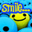 Pixelated yellow smiley faces with black eyes and mouths appear on a blue background with black dots, accompanied by yellow and blue text reading "Smile... it makes people wonder what you're thinking.".